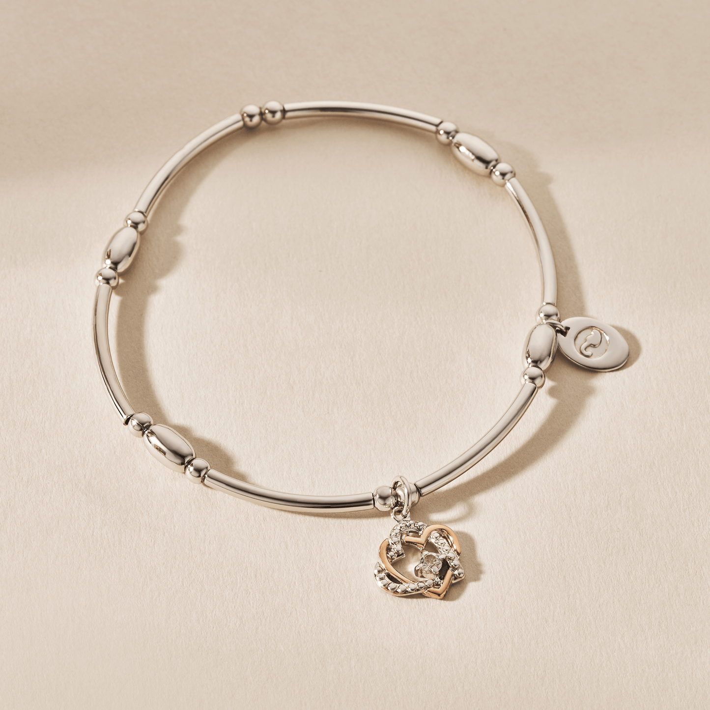 Forever Yours Sterling Silver Heart Affinity Bracelet with Topaz