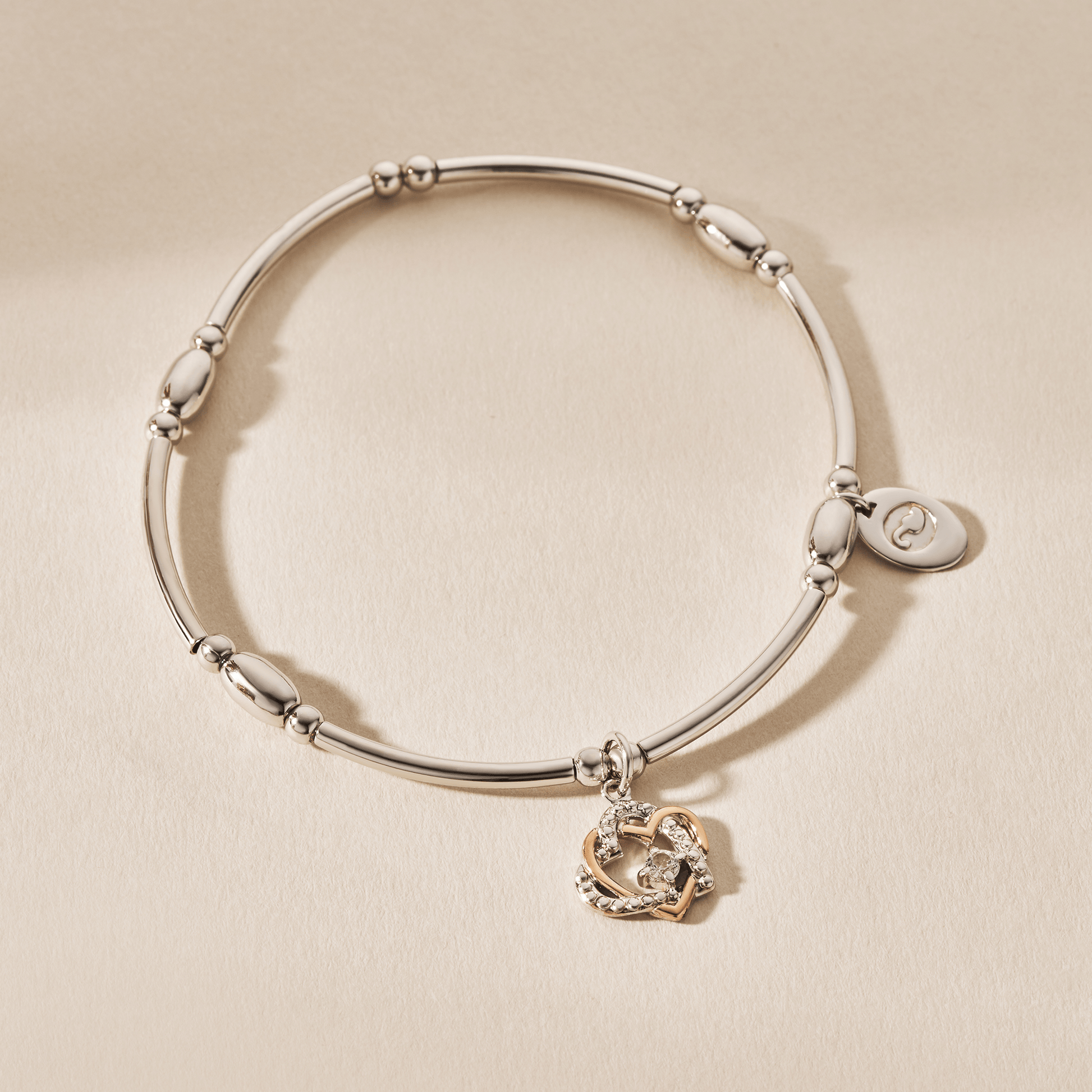 Forever Yours Sterling Silver Heart Affinity Bracelet with Topaz
