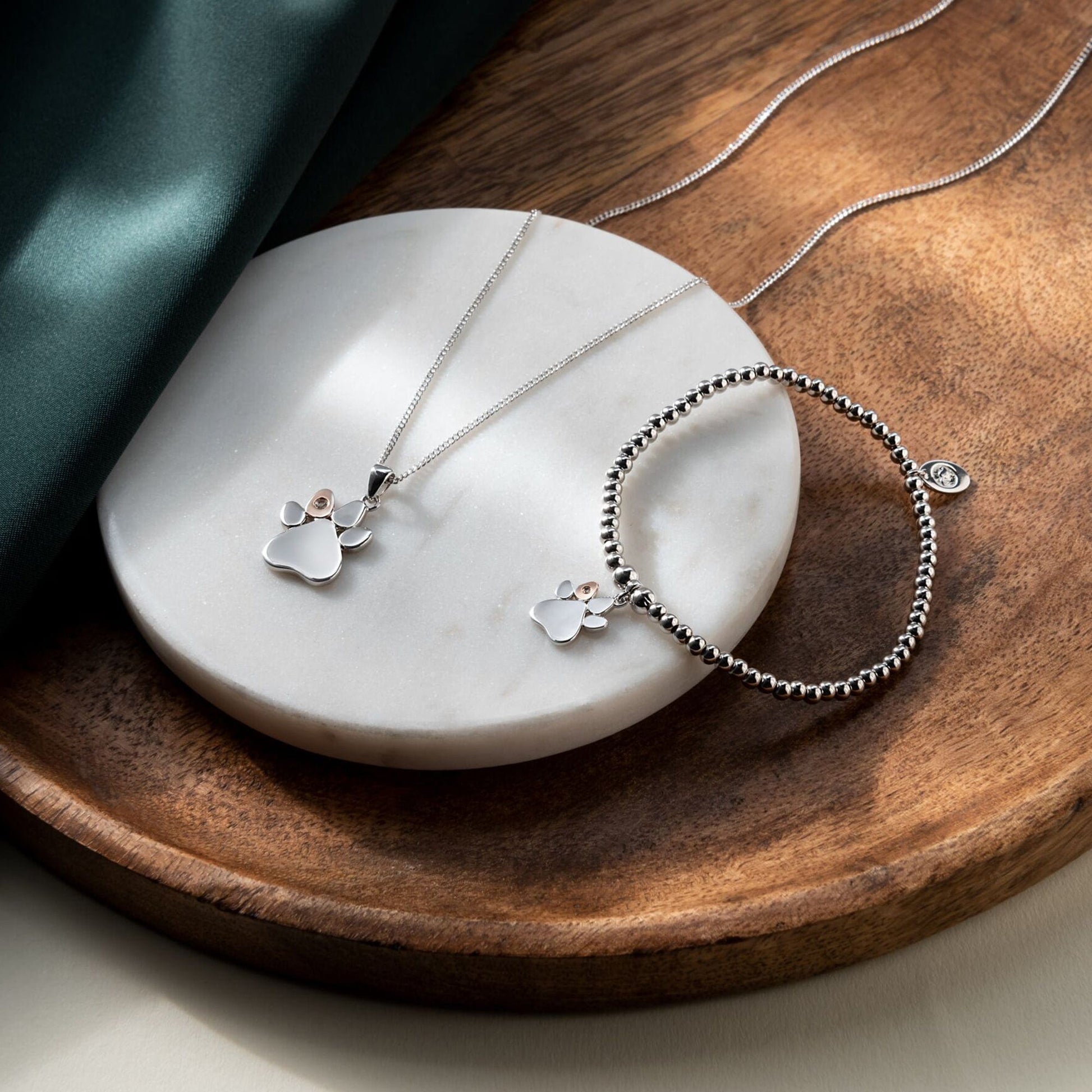 Paw Prints Sterling Silver Pendant with Topaz