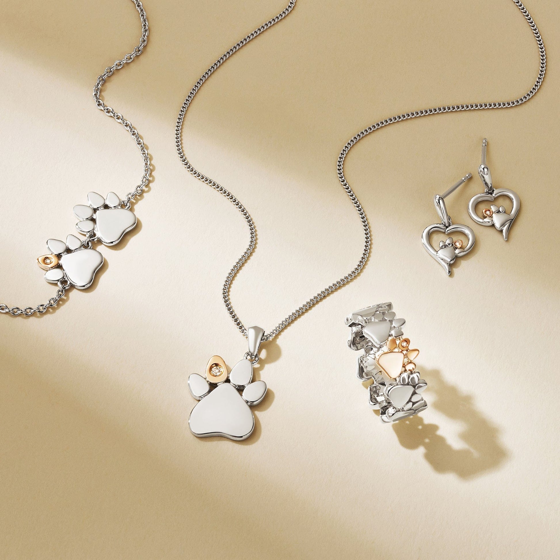 Paw Prints Sterling Silver Pendant with Topaz – Clogau